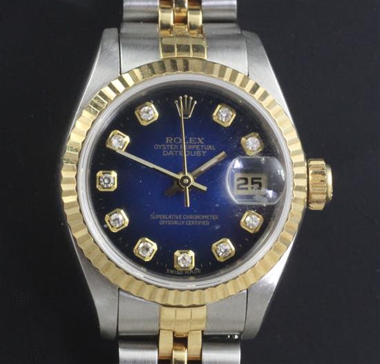 A ladys 18ct gold and steel Rolex Oyster Perpetual Datejust wrist watch with diamond set numerals